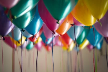 Hang balloons on ceiling using fishing wire to give the look of the  balloons floating mid-air. The effect is really f…