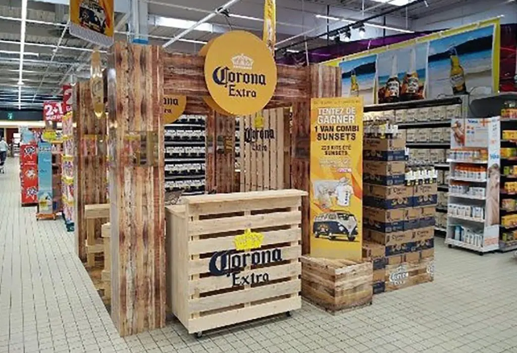 A ceiling display for Corona beer at a grocery store that utilizes ceiling display solutions from Ceiling Outfitters